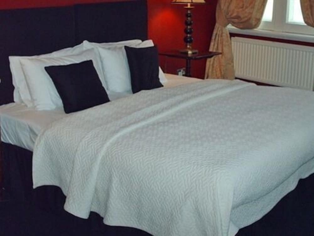 Imagen de la habitación del Hotel The Racquet Club. Foto 10