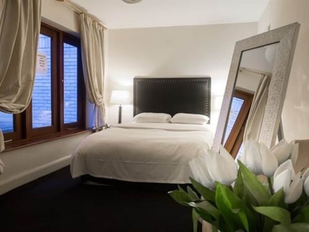 Imagen de la habitación del Hotel The Racquet Club. Foto 11