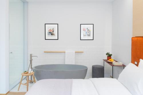 Imagen de la habitación del Hotel The Radical, Via Veneto. Foto 8