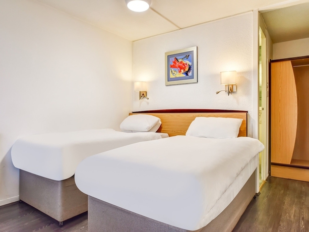 Imagen de la habitación del Hotel The Rafiya. Foto 2