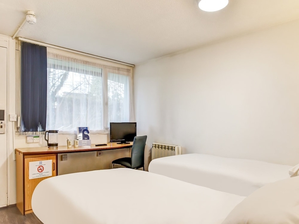 Imagen de la habitación del Hotel The Rafiya. Foto 3