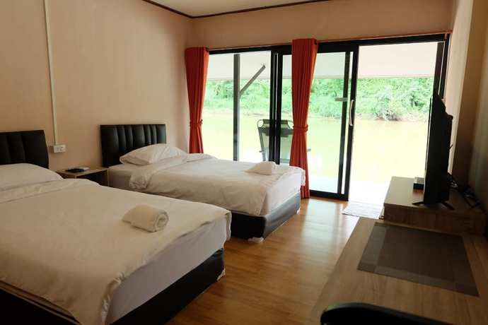 Imagen de la habitación del Hotel The Raft Land. Foto 6