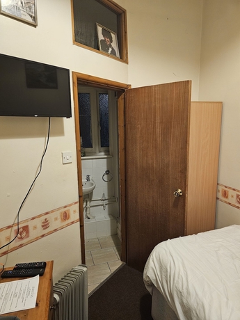 Imagen de la habitación del Hotel The Railway. Foto 6