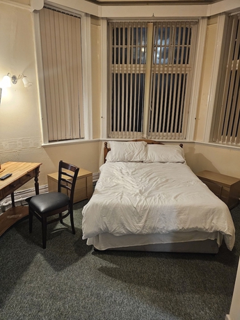 Imagen de la habitación del Hotel The Railway. Foto 12