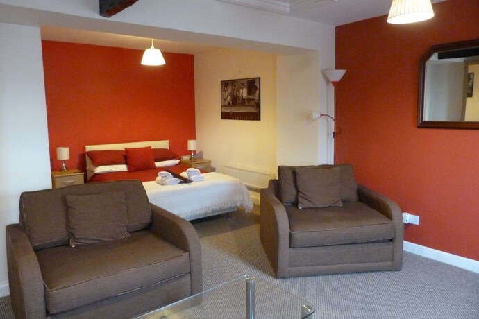 Imagen de la habitación del Hotel The Railway Inn. Foto 19