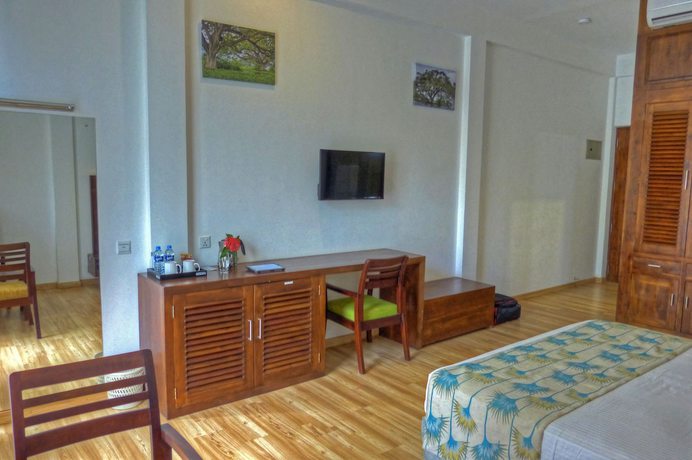 Imagen de la habitación del Hotel The Rain Tree. Foto 9