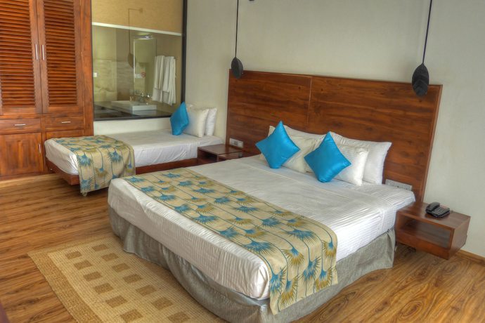 Imagen de la habitación del Hotel The Rain Tree. Foto 10