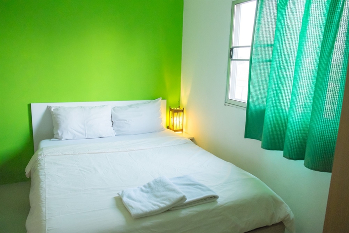 Imagen de la habitación del Hotel The Rainforest Guesthouse and Cafe. Foto 4