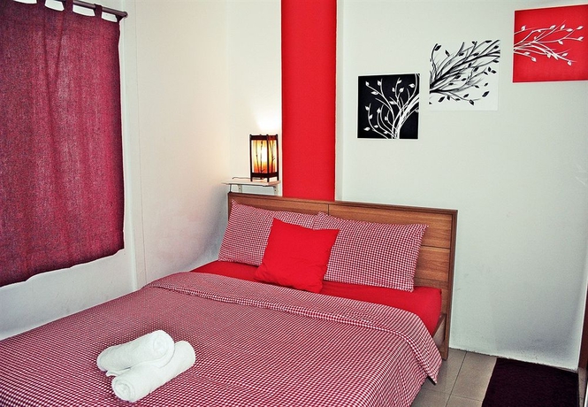 Imagen de la habitación del Hotel The Rainforest Guesthouse and Cafe. Foto 6