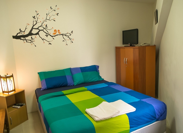 Imagen de la habitación del Hotel The Rainforest Guesthouse and Cafe. Foto 7