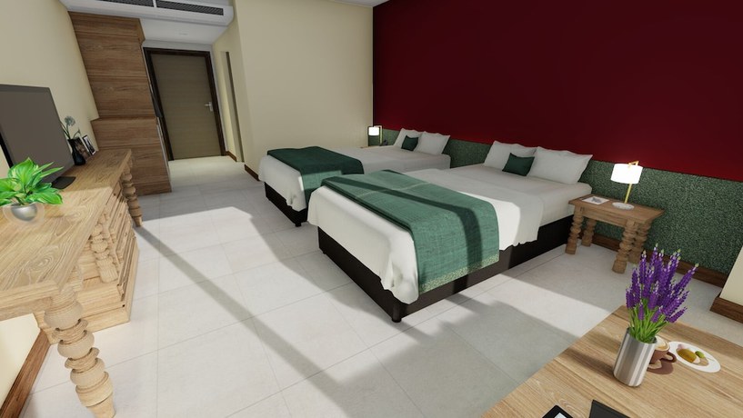 Imagen de la habitación del Hotel The Raintree Chiangmai. Foto 5