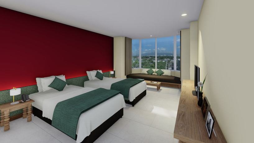 Imagen de la habitación del Hotel The Raintree Chiangmai. Foto 7