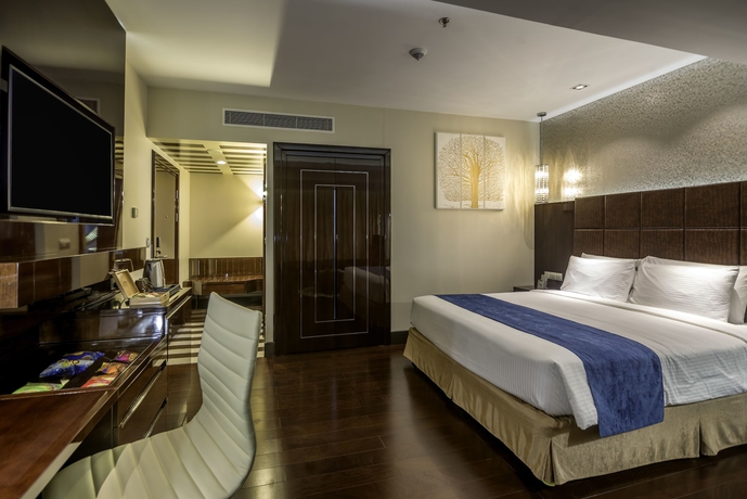 Imagen de la habitación del Hotel The Raintree Dhaka. Foto 5