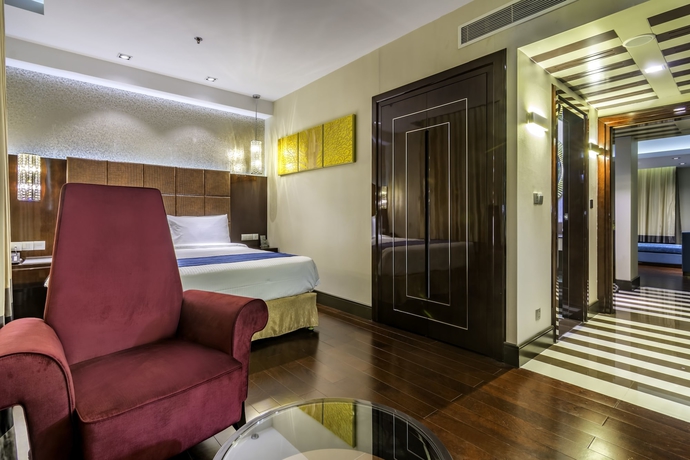 Imagen de la habitación del Hotel The Raintree Dhaka. Foto 9