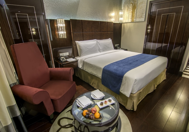 Imagen de la habitación del Hotel The Raintree Dhaka. Foto 10