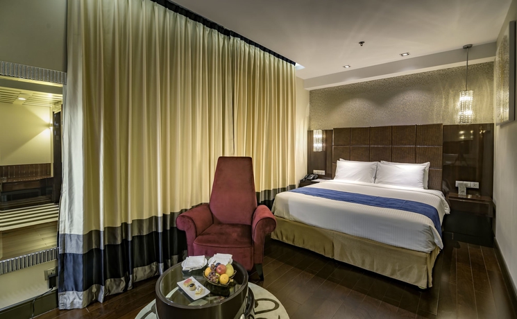 Imagen de la habitación del Hotel The Raintree Dhaka. Foto 16