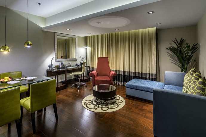 Imagen de la habitación del Hotel The Raintree Dhaka. Foto 17