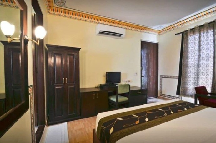 Imagen de la habitación del Hotel The Rajwada Resort and Spa. Foto 10