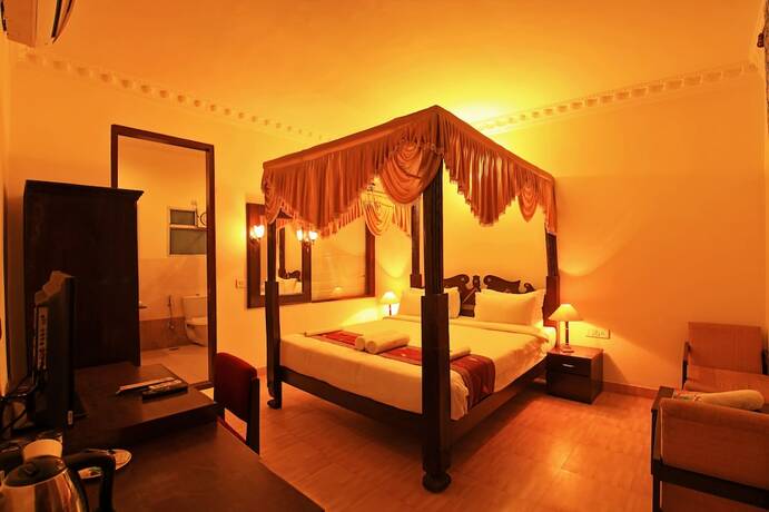 Imagen de la habitación del Hotel The Rajwada Resort and Spa. Foto 11