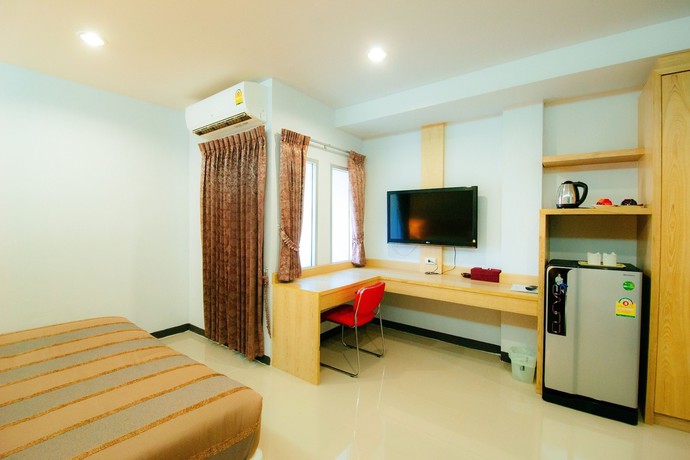 Imagen de la habitación del Hotel The Rama Residence Chiang Rai. Foto 5