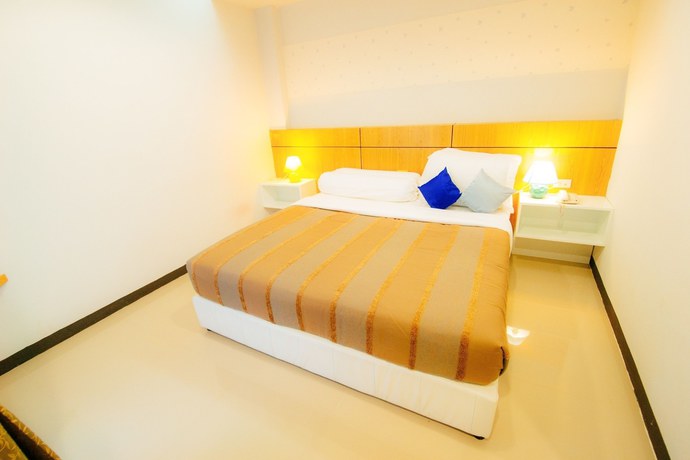 Imagen de la habitación del Hotel The Rama Residence Chiang Rai. Foto 7