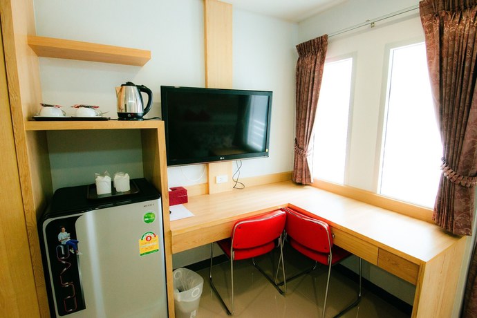 Imagen de la habitación del Hotel The Rama Residence Chiang Rai. Foto 8