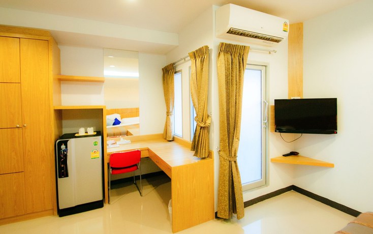 Imagen de la habitación del Hotel The Rama Residence Chiang Rai. Foto 11