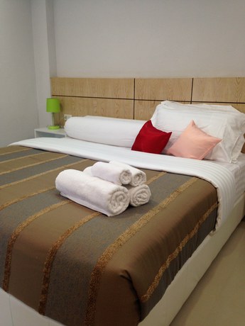 Imagen de la habitación del Hotel The Rama Residence Chiang Rai. Foto 16