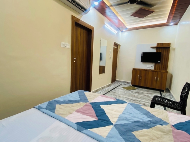 Imagen de la habitación del Hotel The Raman Palace - A Budget. Foto 2