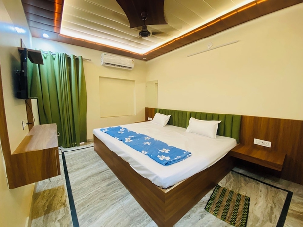 Imagen de la habitación del Hotel The Raman Palace - A Budget. Foto 4