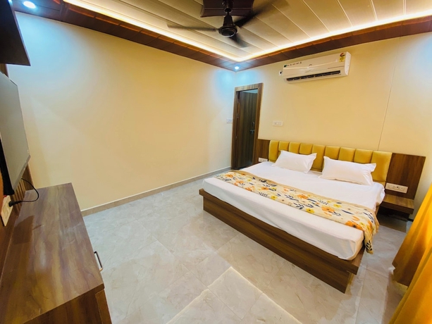 Imagen de la habitación del Hotel The Raman Palace - A Budget. Foto 6