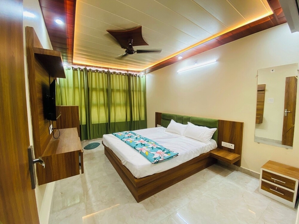 Imagen de la habitación del Hotel The Raman Palace - A Budget. Foto 7