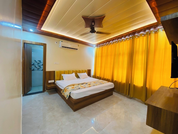 Imagen de la habitación del Hotel The Raman Palace - A Budget. Foto 8