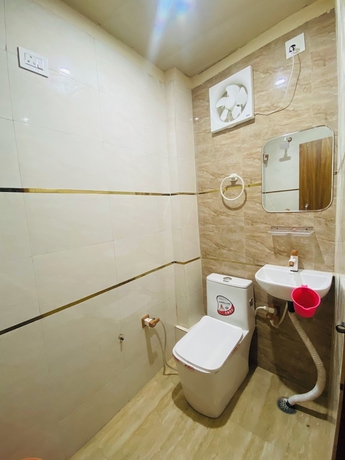 Imagen de la habitación del Hotel The Raman Palace - A Budget. Foto 9