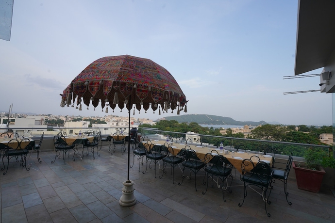 Imagen de la habitación del Hotel The Ramvilas - A Rooftop Lake View in Udaipur. Foto 13
