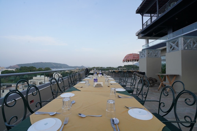 Imagen de la habitación del Hotel The Ramvilas - A Rooftop Lake View in Udaipur. Foto 14