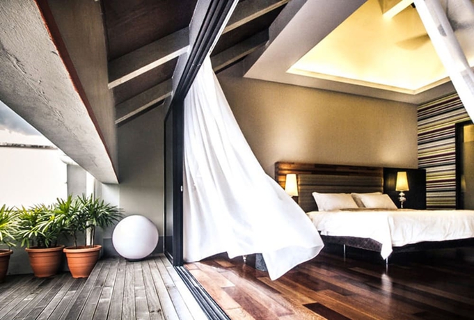 Imagen de la habitación del Hotel The Ranee Boutique Suites. Foto 2