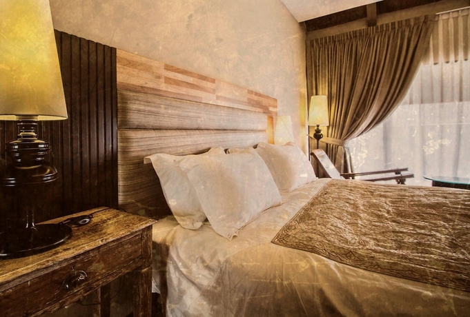 Imagen de la habitación del Hotel The Ranee Boutique Suites. Foto 14