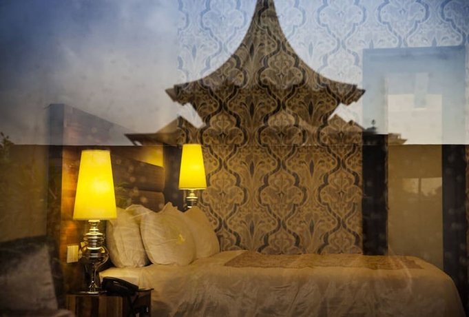 Imagen de la habitación del Hotel The Ranee Boutique Suites. Foto 15