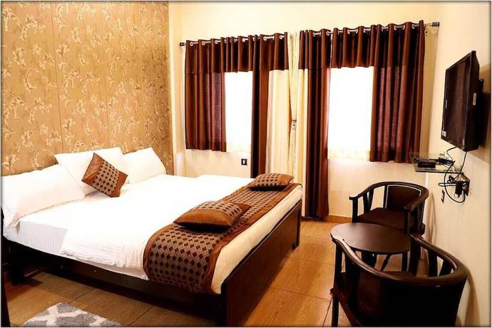 Imagen de la habitación del Hotel The Ranikhet Continental. Foto 8
