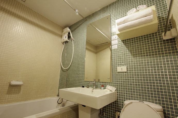Imagen de la habitación del Hotel The Ratchathani. Foto 7