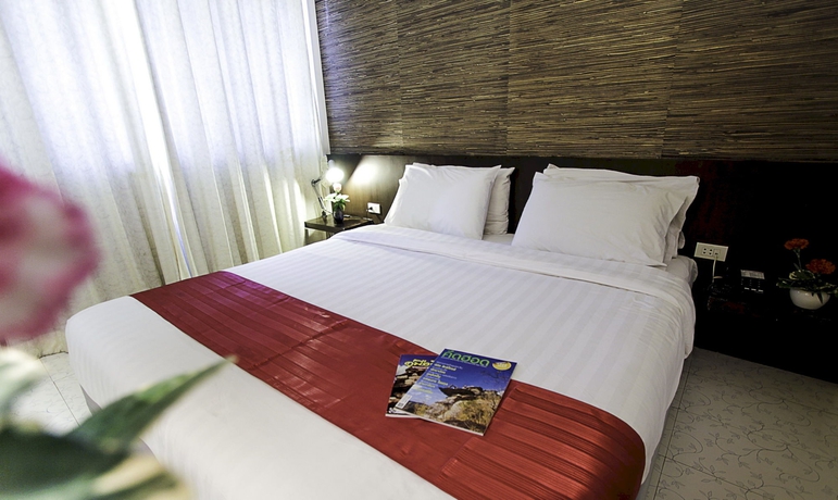 Imagen de la habitación del Hotel The Ratchathani. Foto 8