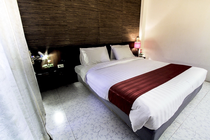 Imagen de la habitación del Hotel The Ratchathani. Foto 9