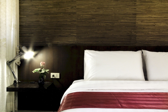 Imagen de la habitación del Hotel The Ratchathani. Foto 10