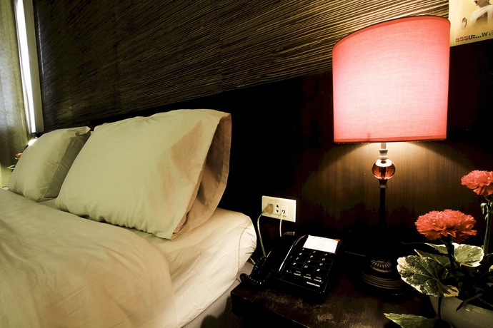 Imagen de la habitación del Hotel The Ratchathani. Foto 11