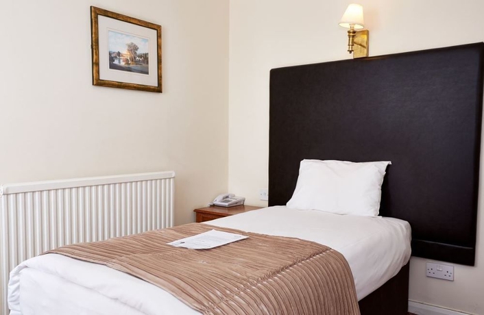 Imagen de la habitación del Hotel The Raven By Greene King Inns. Foto 9