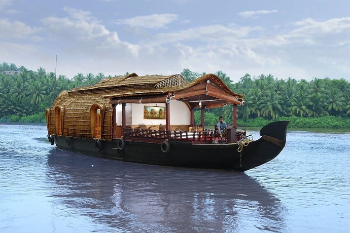 Imagen de la habitación del Hotel The Raviz Kadavu. Foto 2