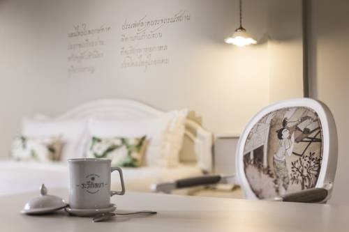 Imagen de la habitación del Hotel The Raweekanlaya Bangkok. Foto 14