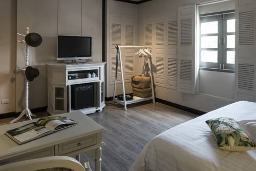 Imagen de la habitación del Hotel The Raweekanlaya Bangkok. Foto 16