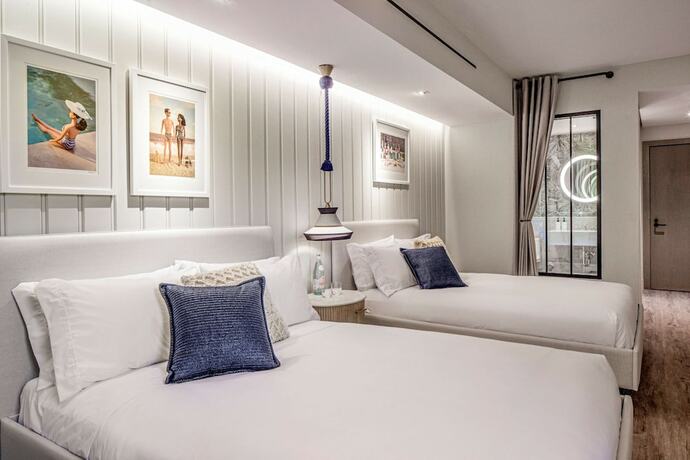 Imagen de la habitación del Hotel The Ray Delray Beach, Curio Collection By Hilton. Foto 20